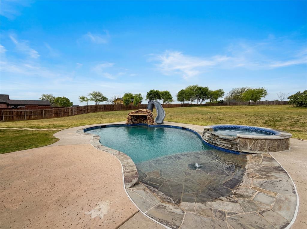 6411 Caliche Circle Midlothian, TX 76065 - Photo 3 of 26 a view of a lake with a ocean view