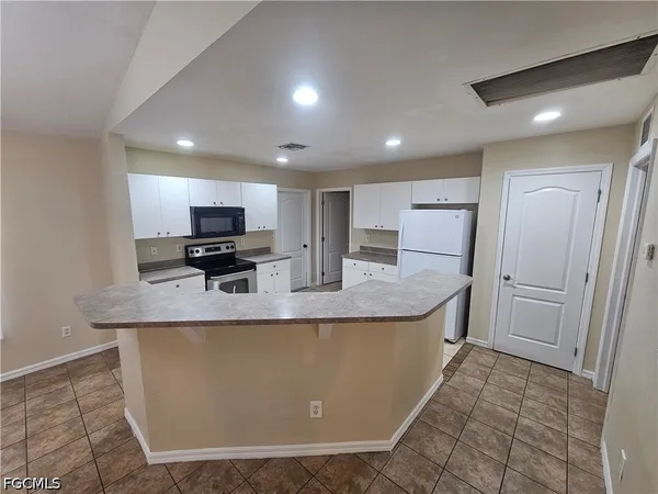 $1,750 | 744 Burns Avenue South, Lehigh Acres, FL 33974