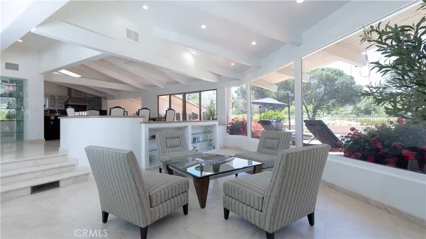 a kitchen with stainless steel appliances granite countertop a stove and a sink