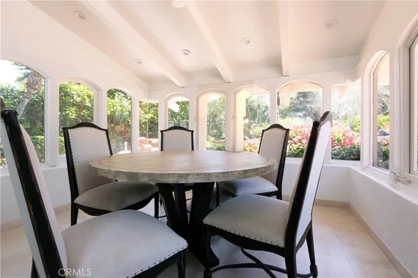 a kitchen with granite countertop a stove and a microwave