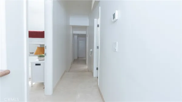 a bedroom with bed and window