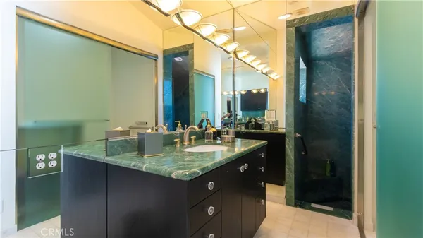 a view of a park with large trees