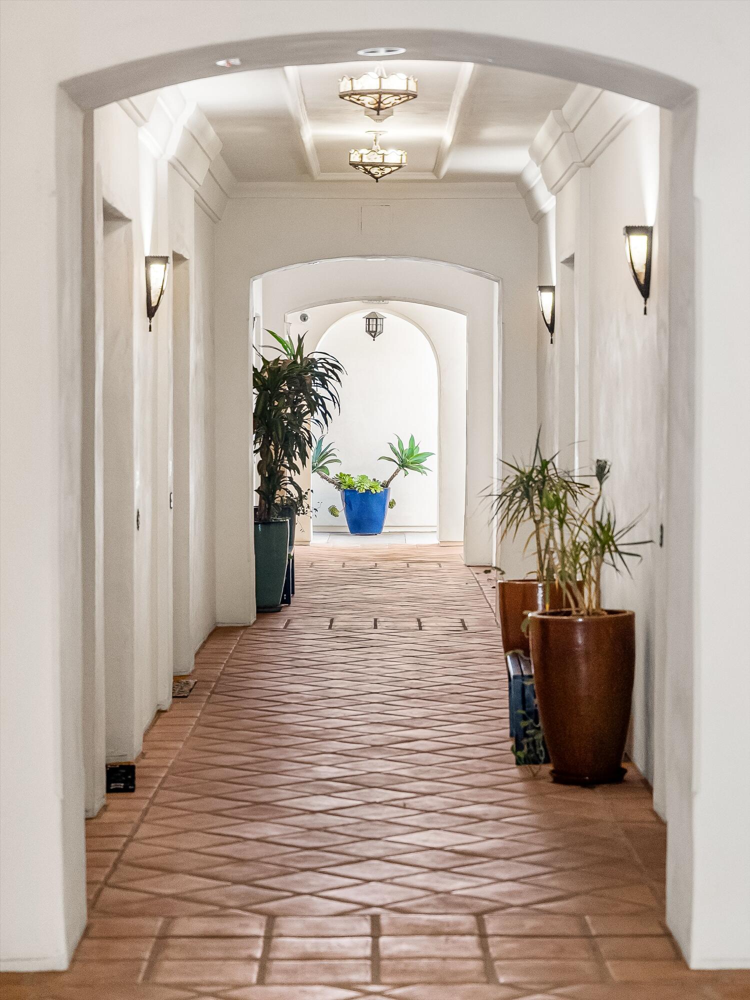 401 Chapala Street, Unit 214 Santa Barbara, CA 93101 - Photo 4 of 31 a view of a living room and bathroom