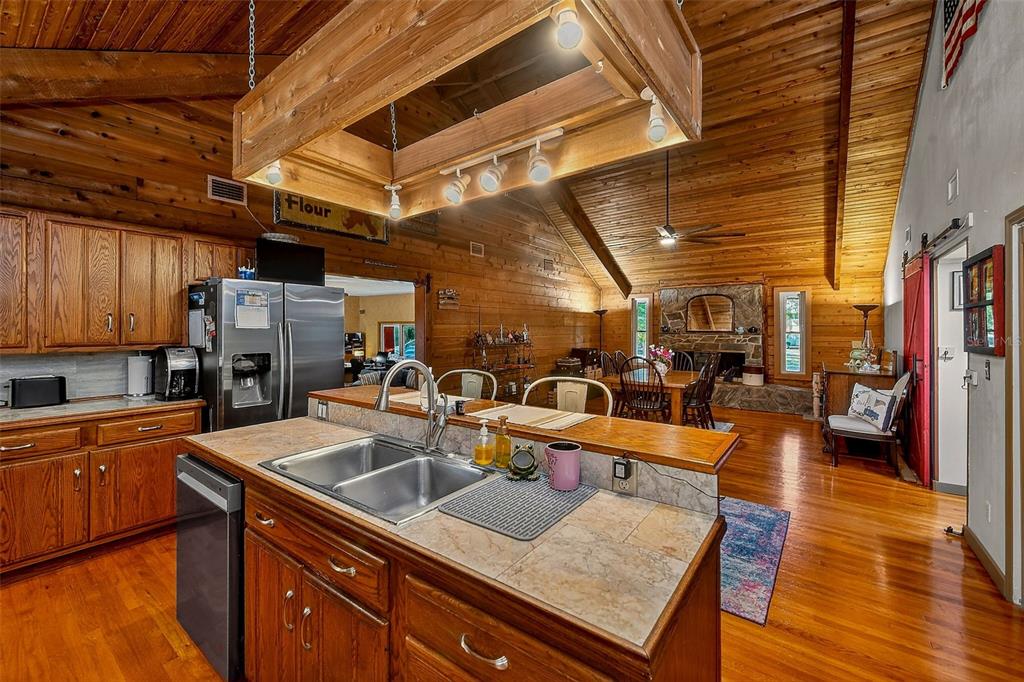 2635 North Dover Road Dover, FL 33527 - Photo 15 of 84 a view of a kitchen with sink and wooden cabinets