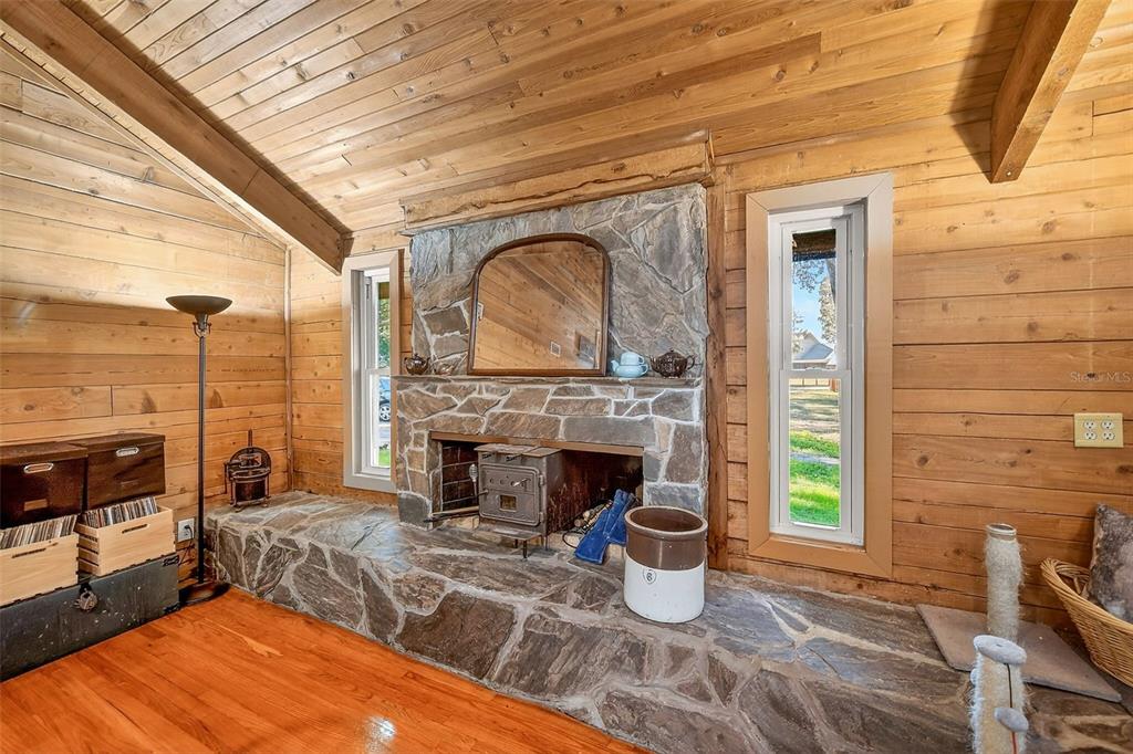 2635 North Dover Road Dover, FL 33527 - Photo 26 of 84 a living room with furniture and a fireplace