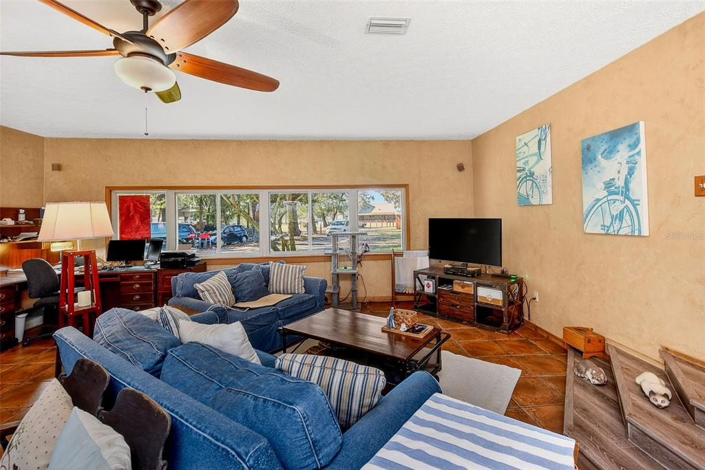 2635 North Dover Road Dover, FL 33527 - Photo 29 of 84 a living room with furniture and a flat screen tv