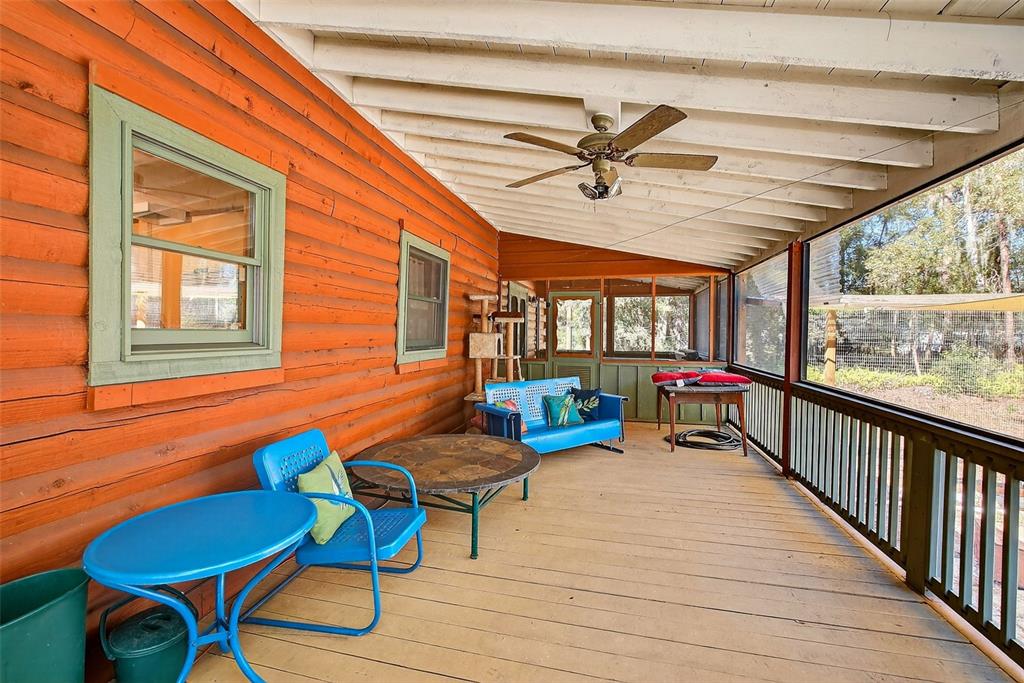 2635 North Dover Road Dover, FL 33527 - Photo 47 of 84 a view of a chairs and table in patio