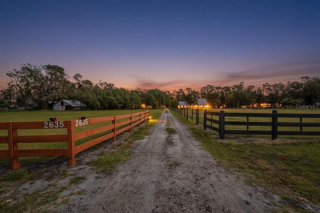2635 North Dover Road Dover, FL 33527 - Photo 66 of 84 a view of a yard with wooden fence