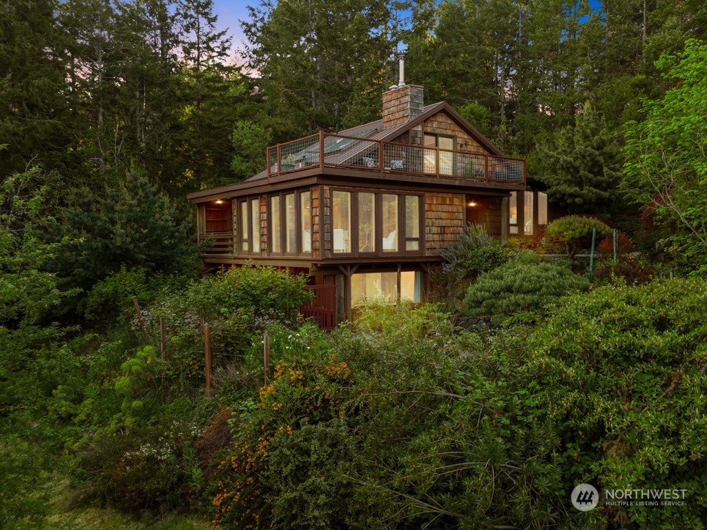 5610 Cape George Road Port Townsend, WA 98368 - Photo 37 of 37 a front view of a house with yard and trees
