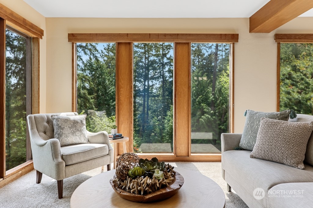 5610 Cape George Road Port Townsend, WA 98368 - Photo 5 of 37 a living room with furniture and a large window