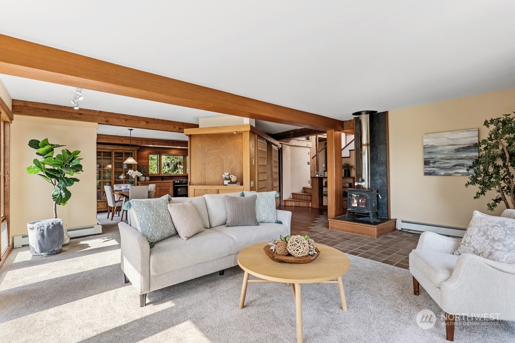 5610 Cape George Road Port Townsend, WA 98368 - Photo 6 of 37 a living room with furniture and a potted plant