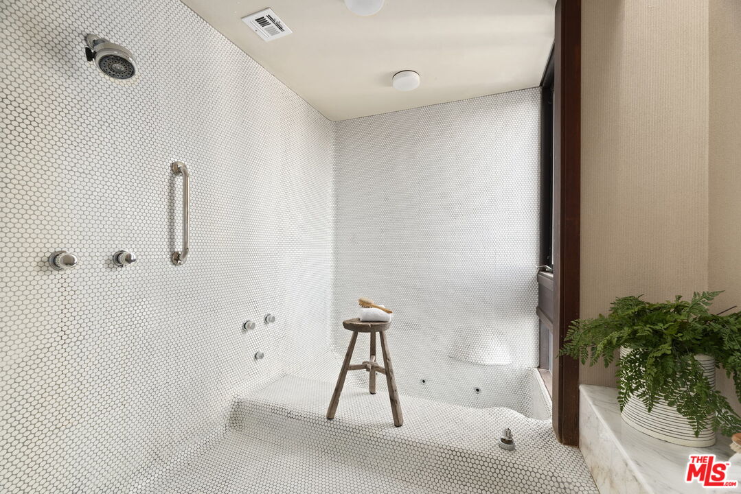 407 Upper Mesa Road Santa Monica, CA 90402 - Photo 30 of 54 a bathroom with a shower