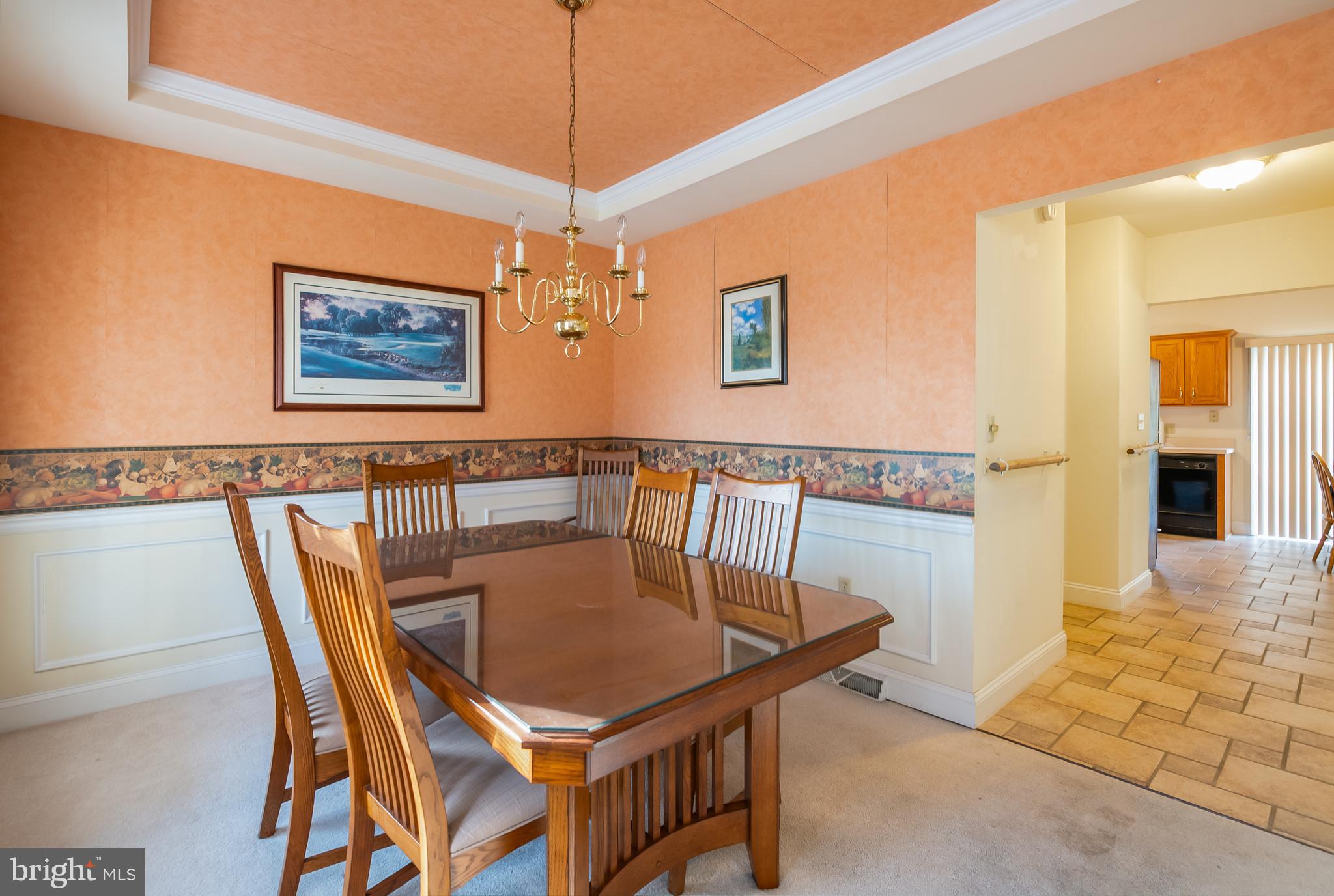 592 Wolfe Lane Mohnton, PA 19540 - Photo 12 of 31 a view of a dining room with furniture and chandelier