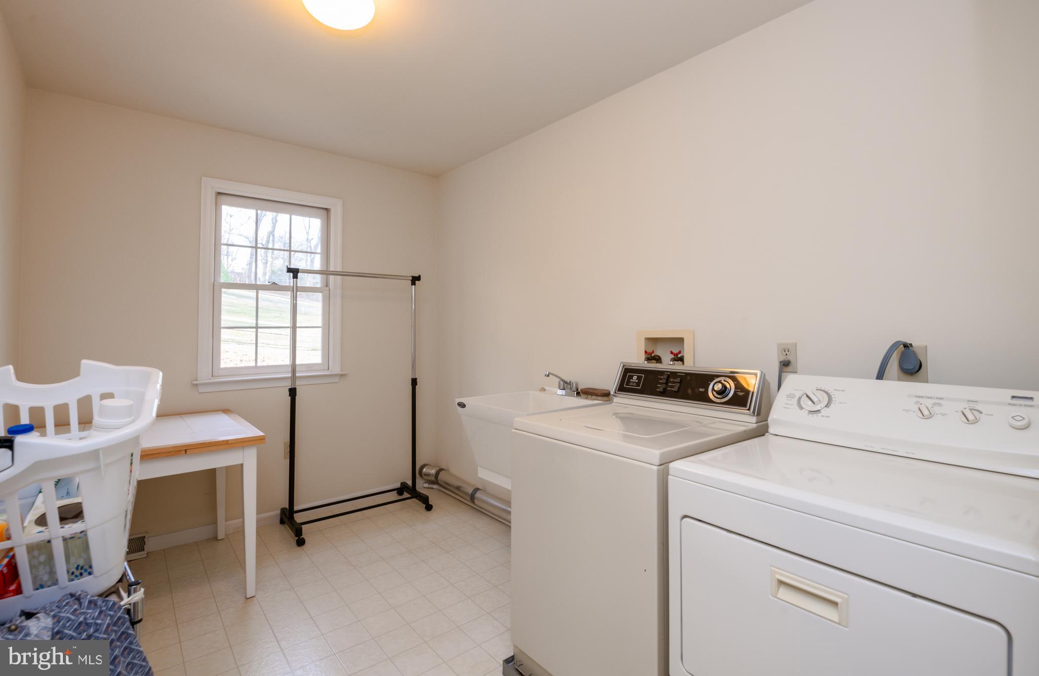 592 Wolfe Lane Mohnton, PA 19540 - Photo 23 of 31 a utility room with dryer and washer