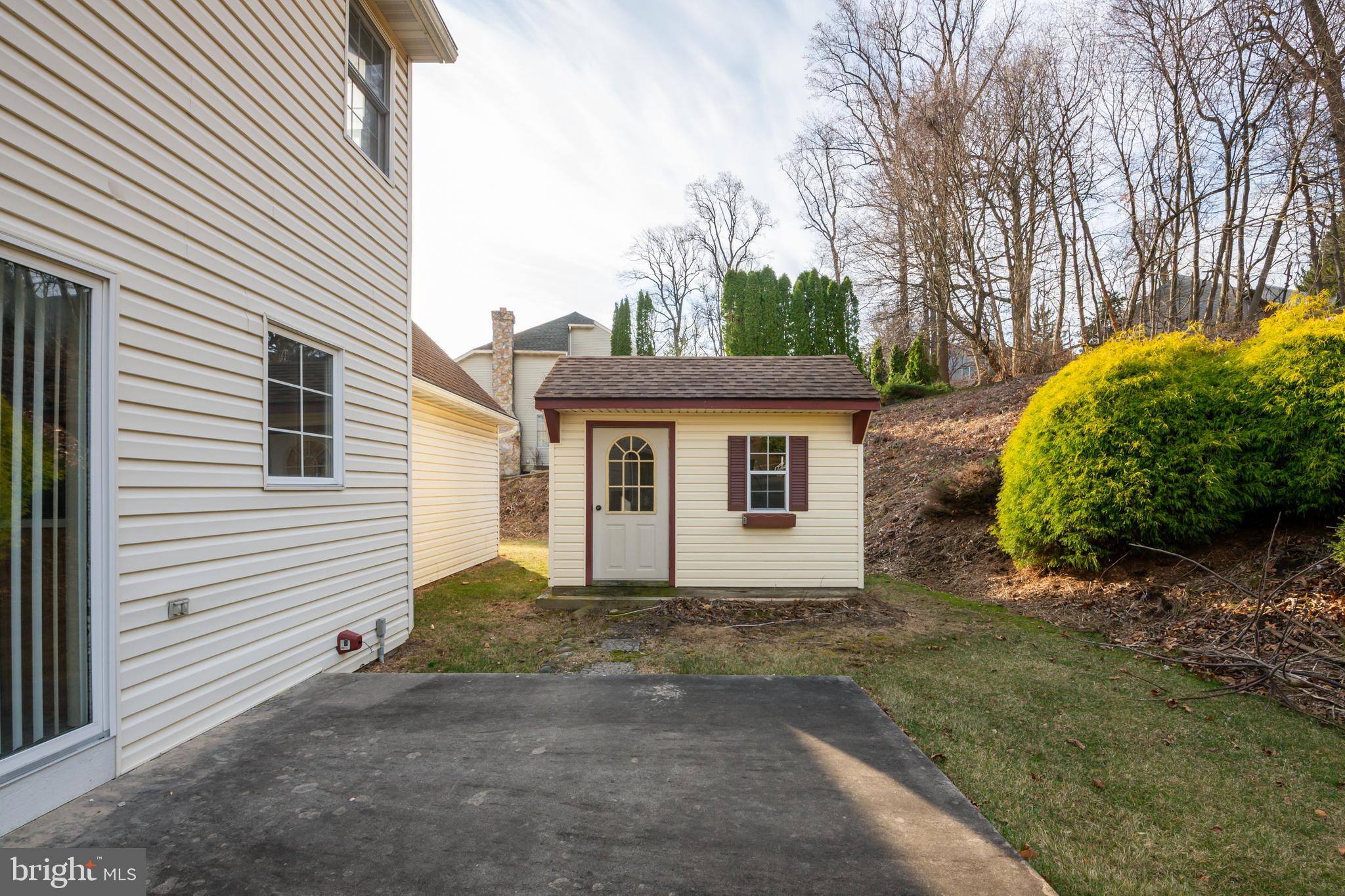 592 Wolfe Lane Mohnton, PA 19540 - Photo 31 of 31 a view of a house with a yard