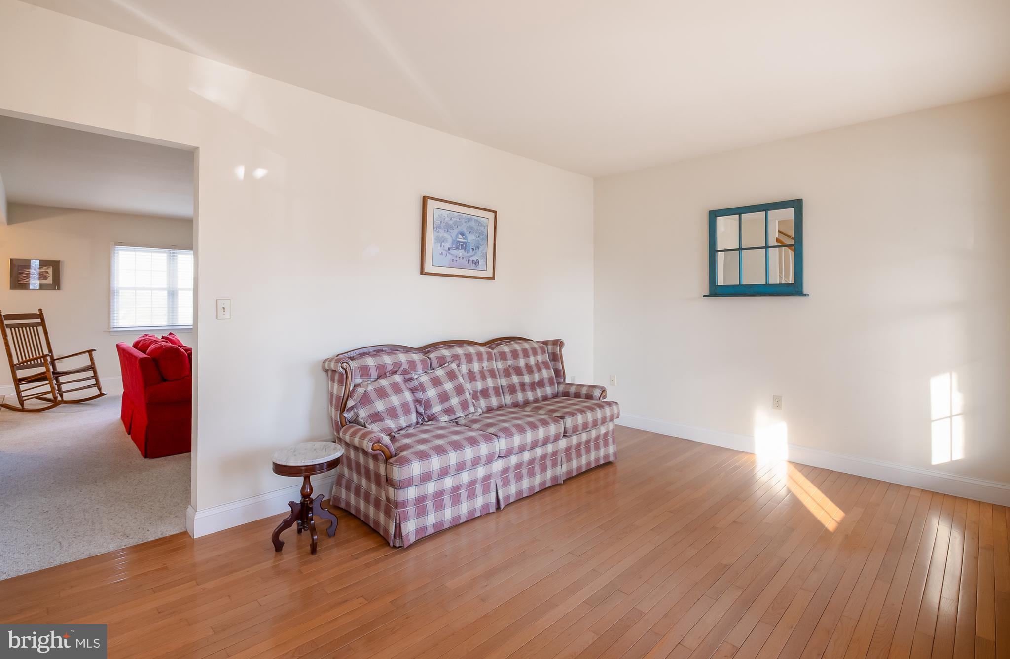 592 Wolfe Lane Mohnton, PA 19540 - Photo 10 of 31 a living room with furniture and a wooden floor