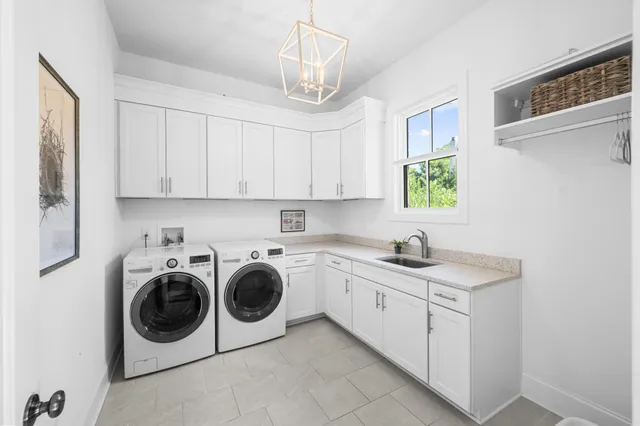 a view of a patio with dining table and chairs potted plants