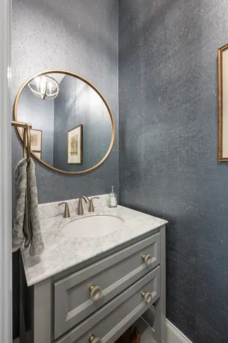 a outdoor space with patio the table and chairs under an umbrella