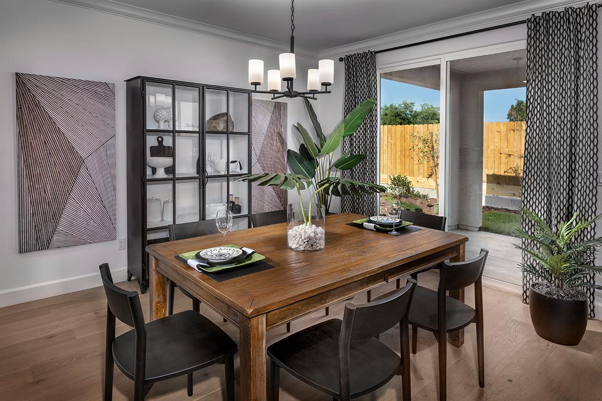 3235 Lourdes Avenue Clovis, CA 93619 - Photo 8 of 13 a view of a dining room with furniture window and wooden floor