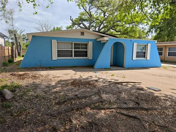 a house with yard in front of it