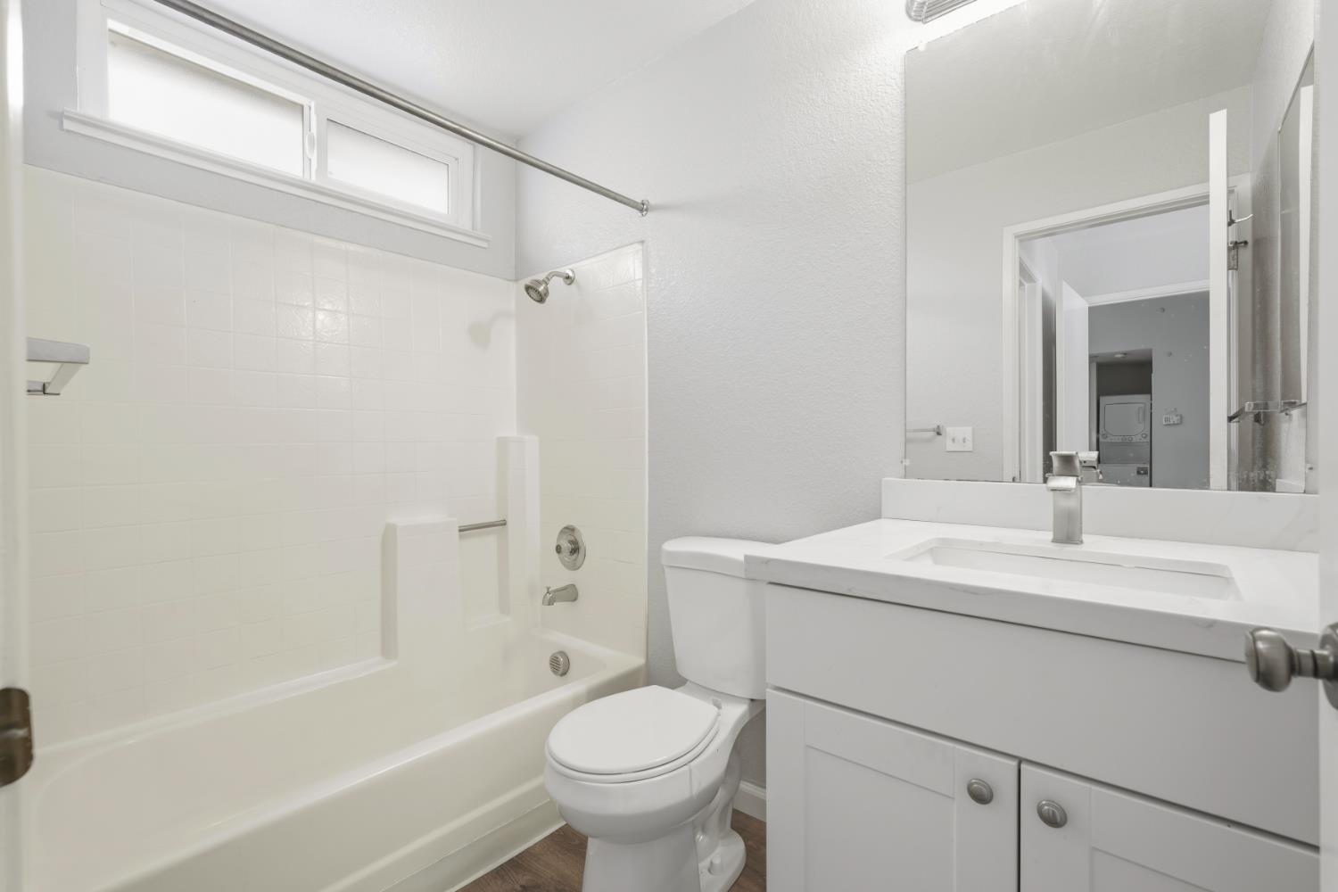 3 Lancaster Circle, Unit 209 Bay Point, CA 94565 - Photo 14 of 30 a bathroom with a sink toilet vanity and shower
