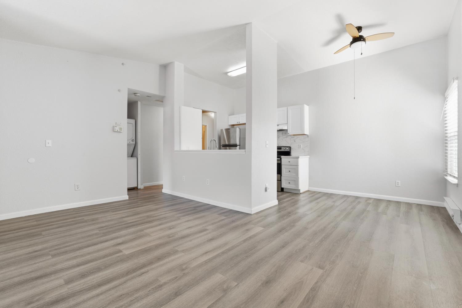 3 Lancaster Circle, Unit 209 Bay Point, CA 94565 - Photo 4 of 30 wooden floor in an empty room with a window