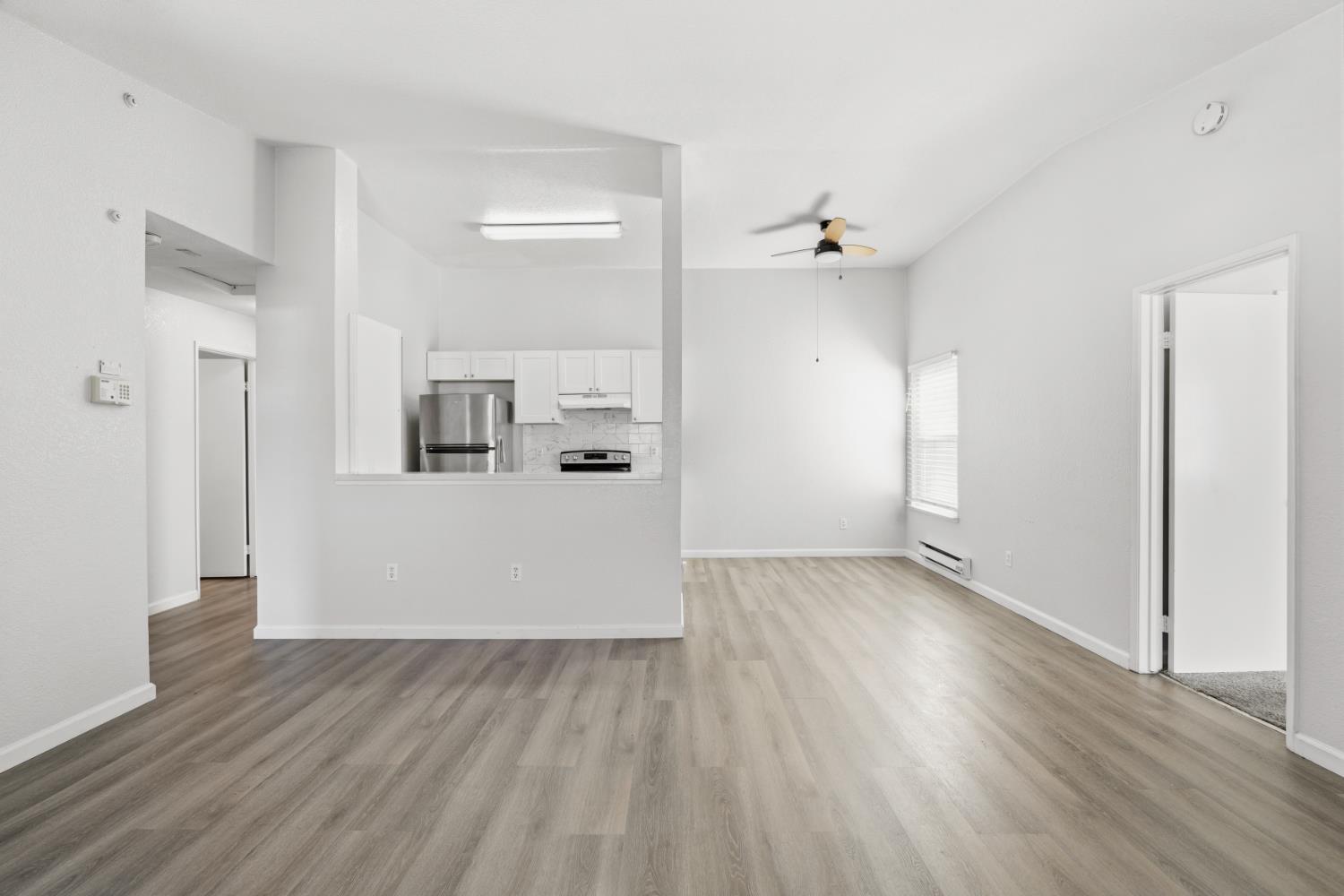 3 Lancaster Circle, Unit 209 Bay Point, CA 94565 - Photo 5 of 30 wooden floor in an empty room with a window