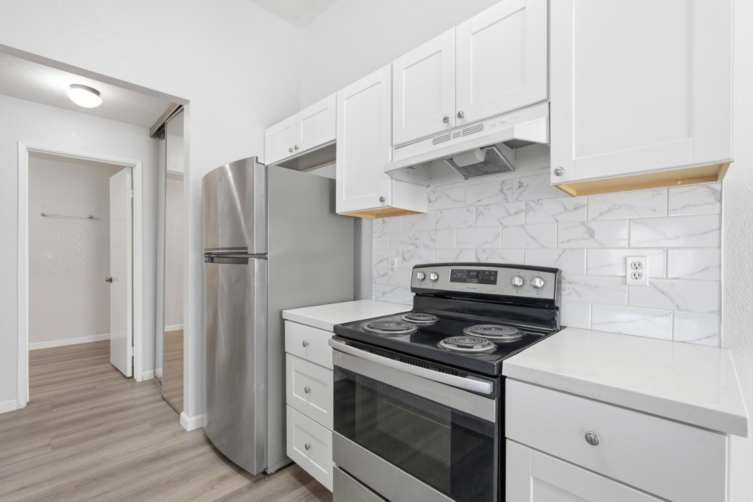 3 Lancaster Circle, Unit 209 Bay Point, CA 94565 - Photo 8 of 30 a kitchen with appliances and cabinets