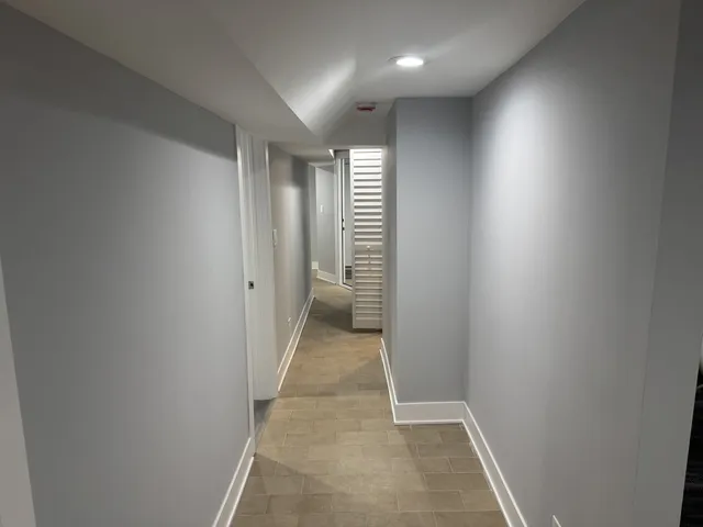 a view of hallway with stairs