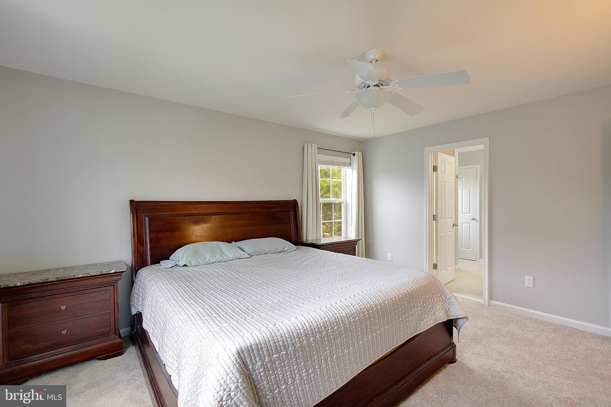 403 Venton Road Edgewater, MD 21037 - Photo 30 of 62 a bedroom with a bed and window