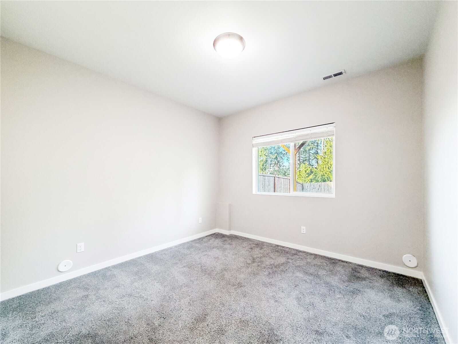 22724 41st Drive Southeast Bothell, WA 98021 - Photo 36 of 40 an empty room with windows