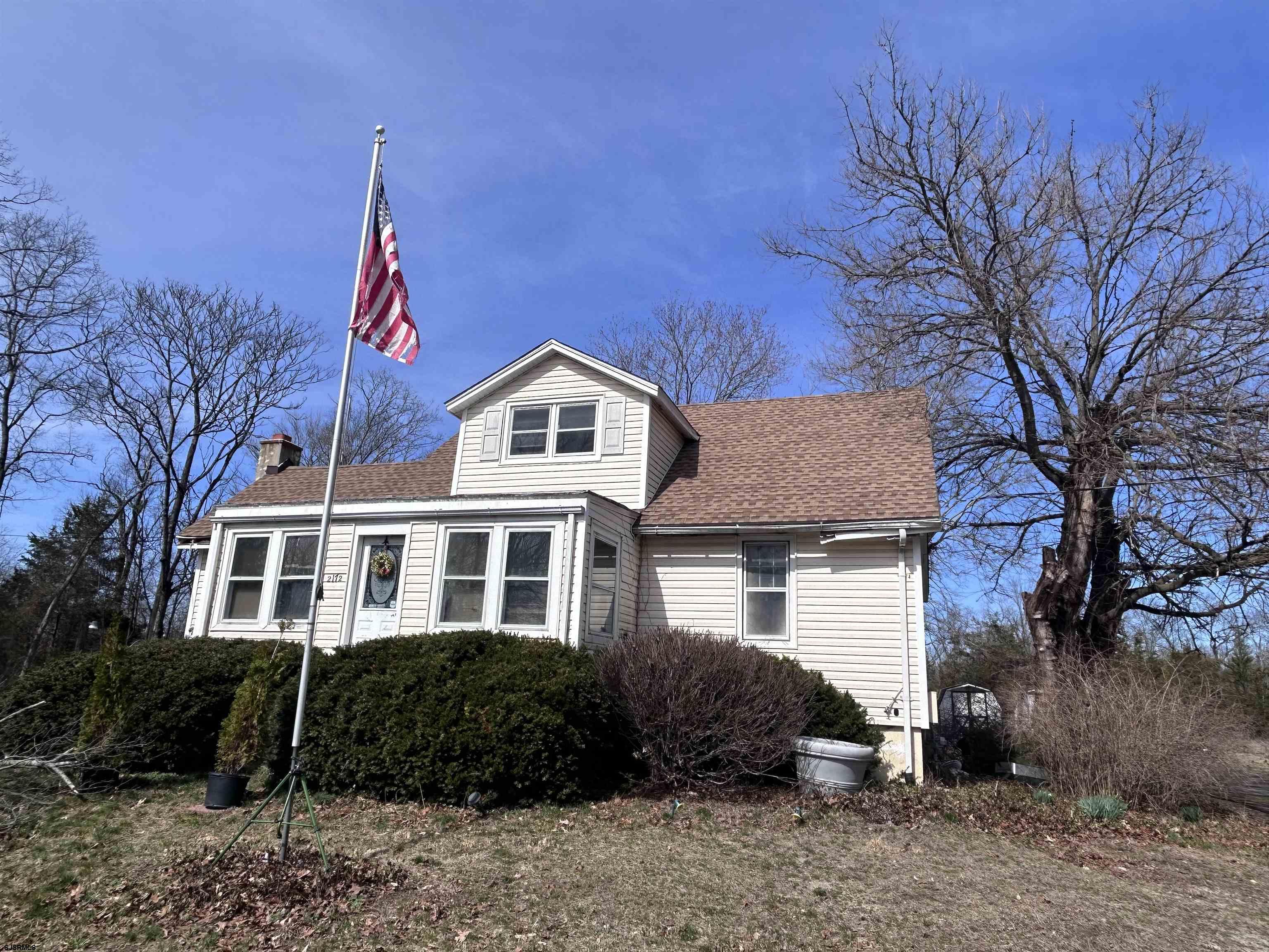 2172 Almond Road Vineland, NJ 08360 - Photo 2 of 5 a front view of a house with garden