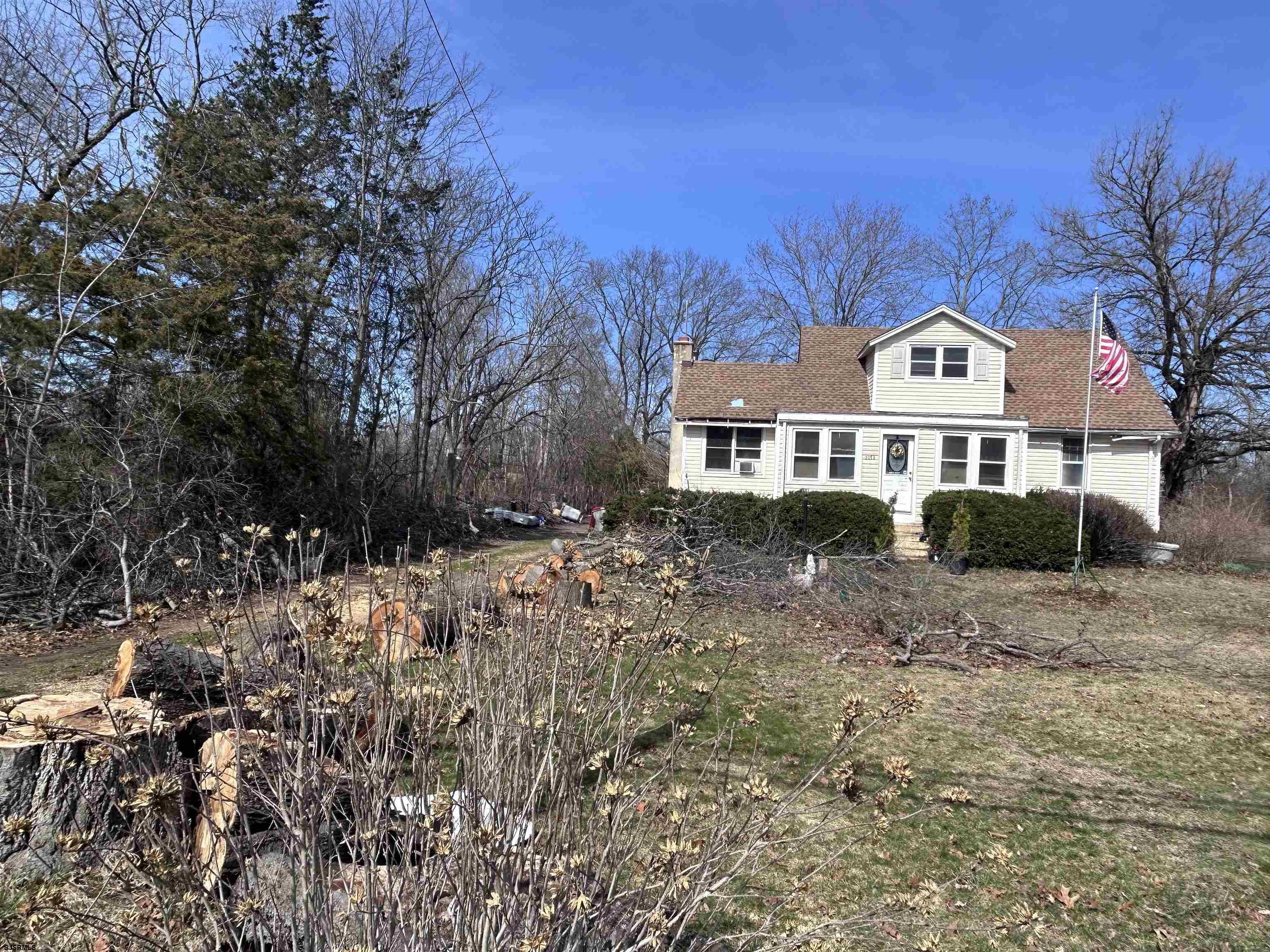 2172 Almond Road Vineland, NJ 08360 - Photo 3 of 5 a front view of a house with a yard