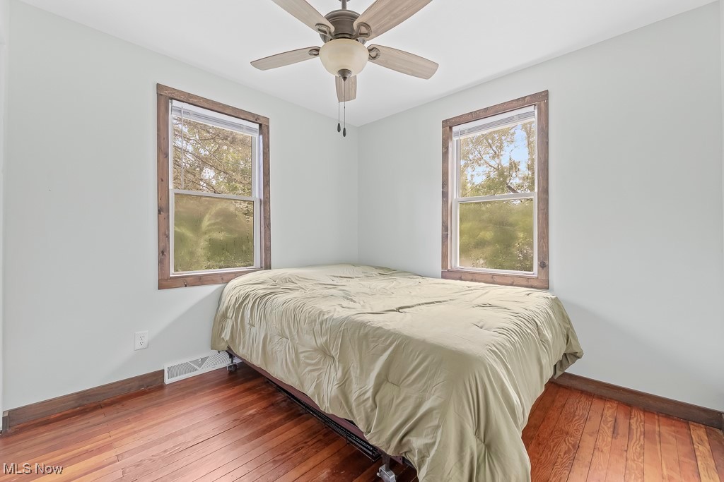 282 Johnson Road Wadsworth, OH 44281 - Photo 22 of 50 Bedroom featuring hardwood / wood-style floors and ceiling fan