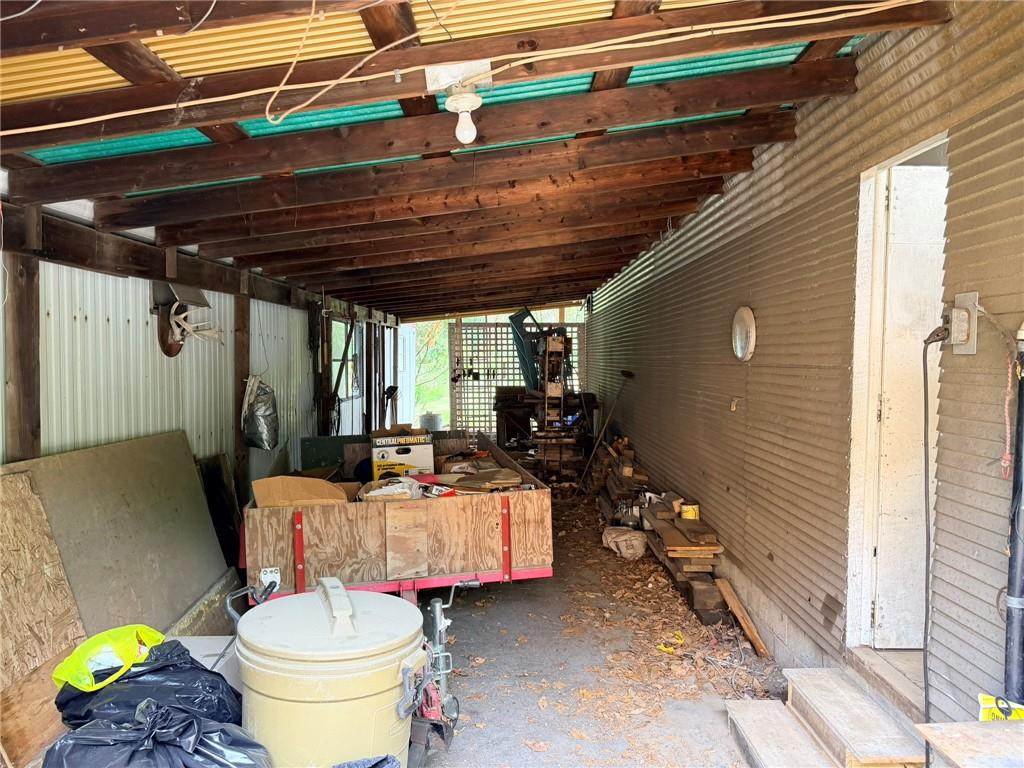 96 South Kings Creek Road Burgettstown, PA 15021 - Photo 40 of 48 Breezeway between Shop and Covered Trailer