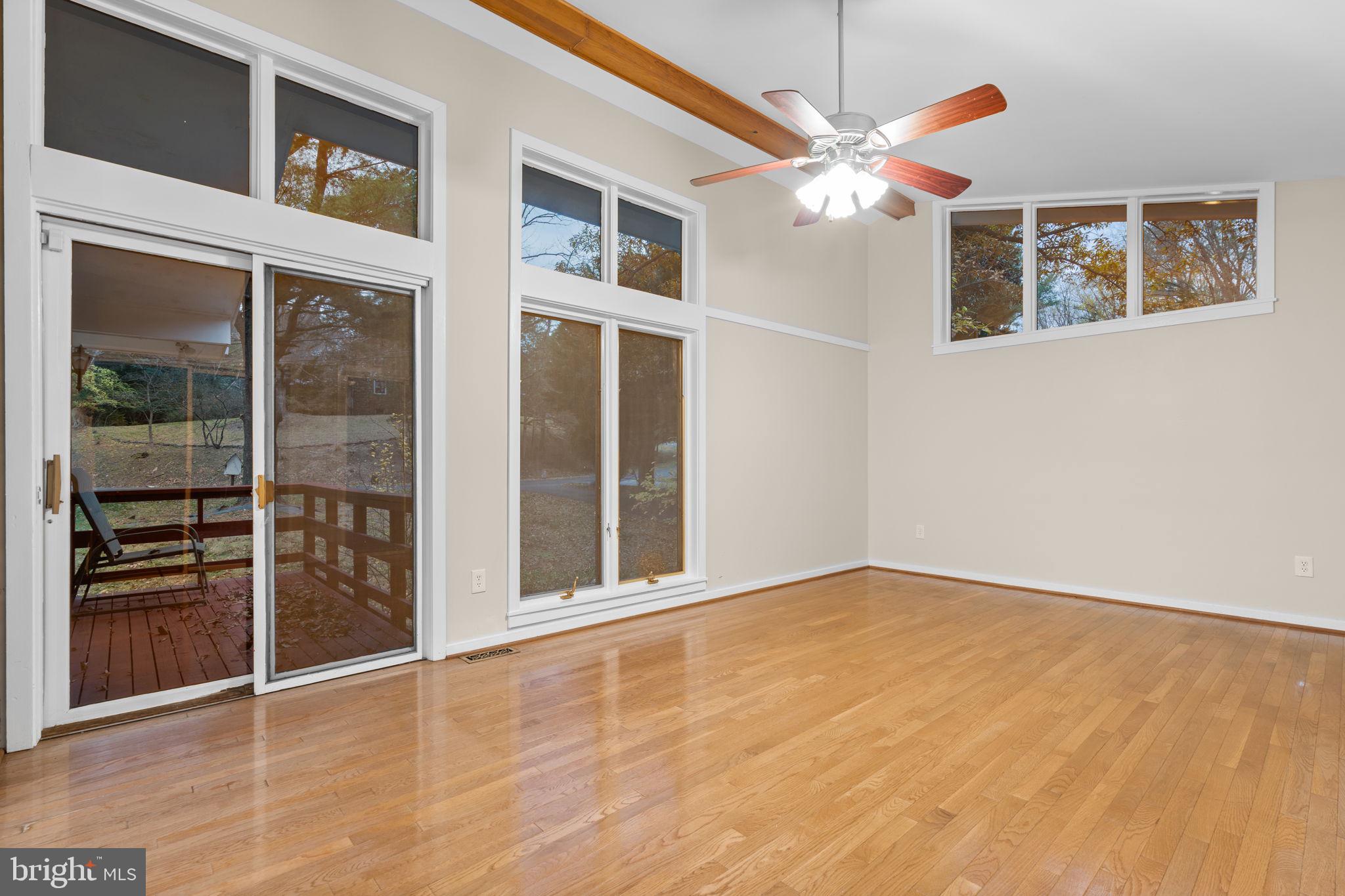 7711 Arrowood Court Bethesda, MD 20817 - Photo 19 of 59 a view of an empty room with a window