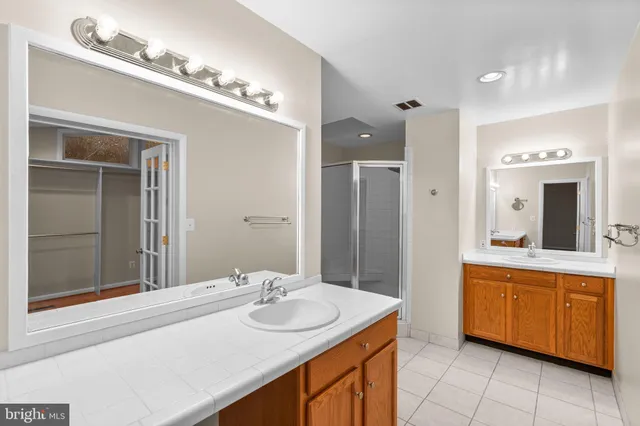 a view of room with wooden floor and window