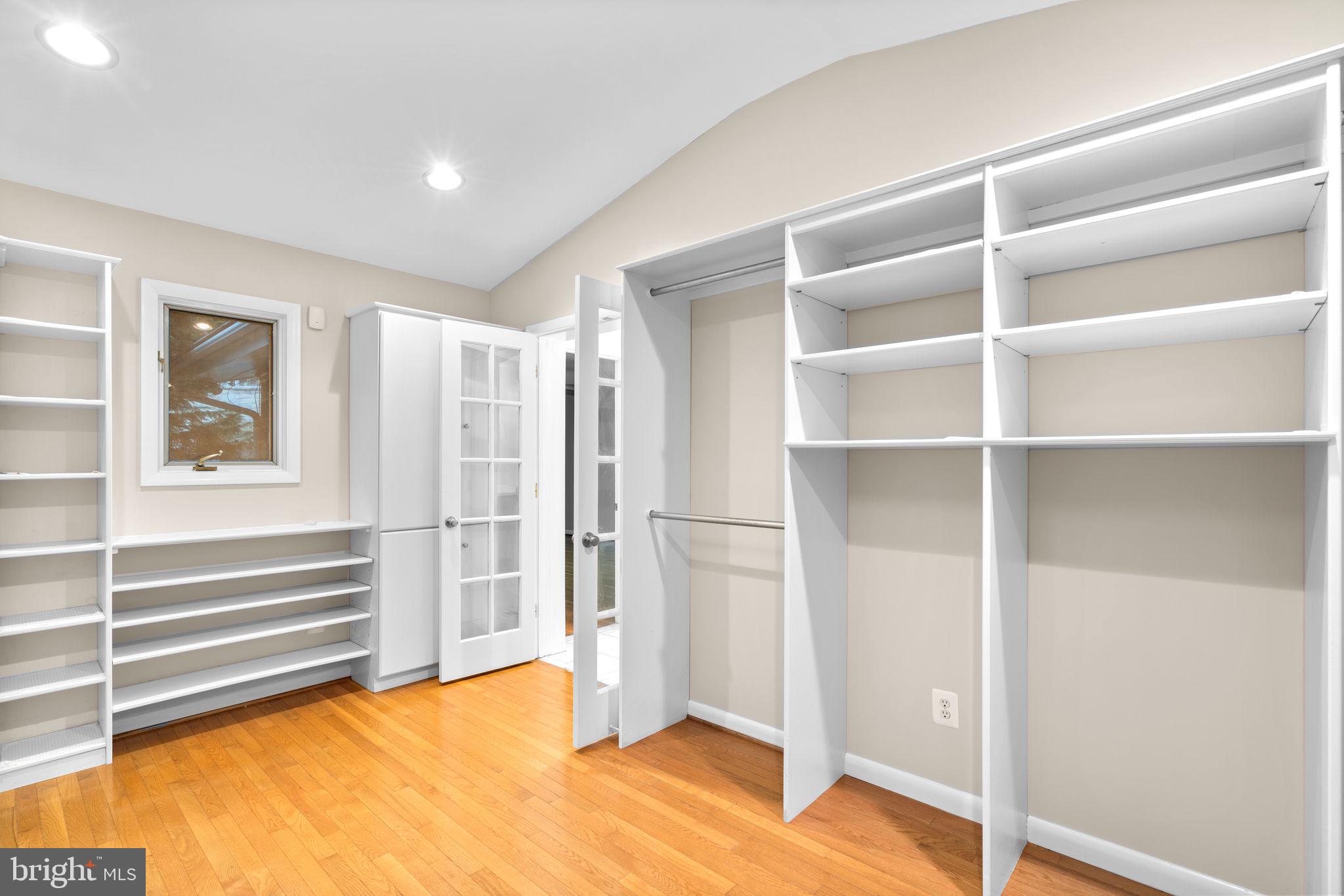 7711 Arrowood Court Bethesda, MD 20817 - Photo 29 of 59 a view of room with wooden floor and window