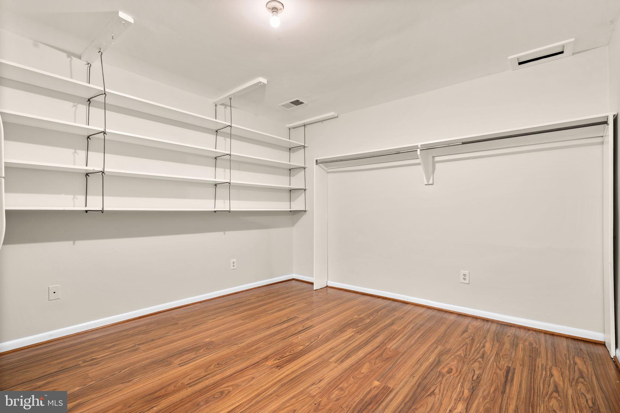7711 Arrowood Court Bethesda, MD 20817 - Photo 48 of 59 a view of a room with empty racks