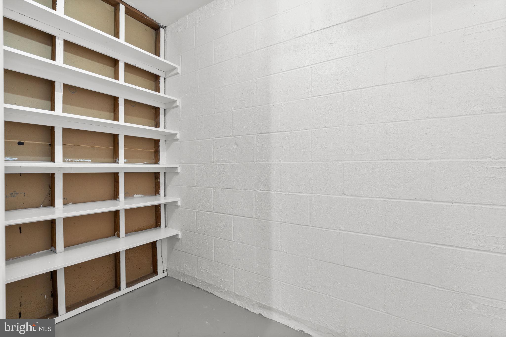 7711 Arrowood Court Bethesda, MD 20817 - Photo 49 of 59 a view of a room with empty racks