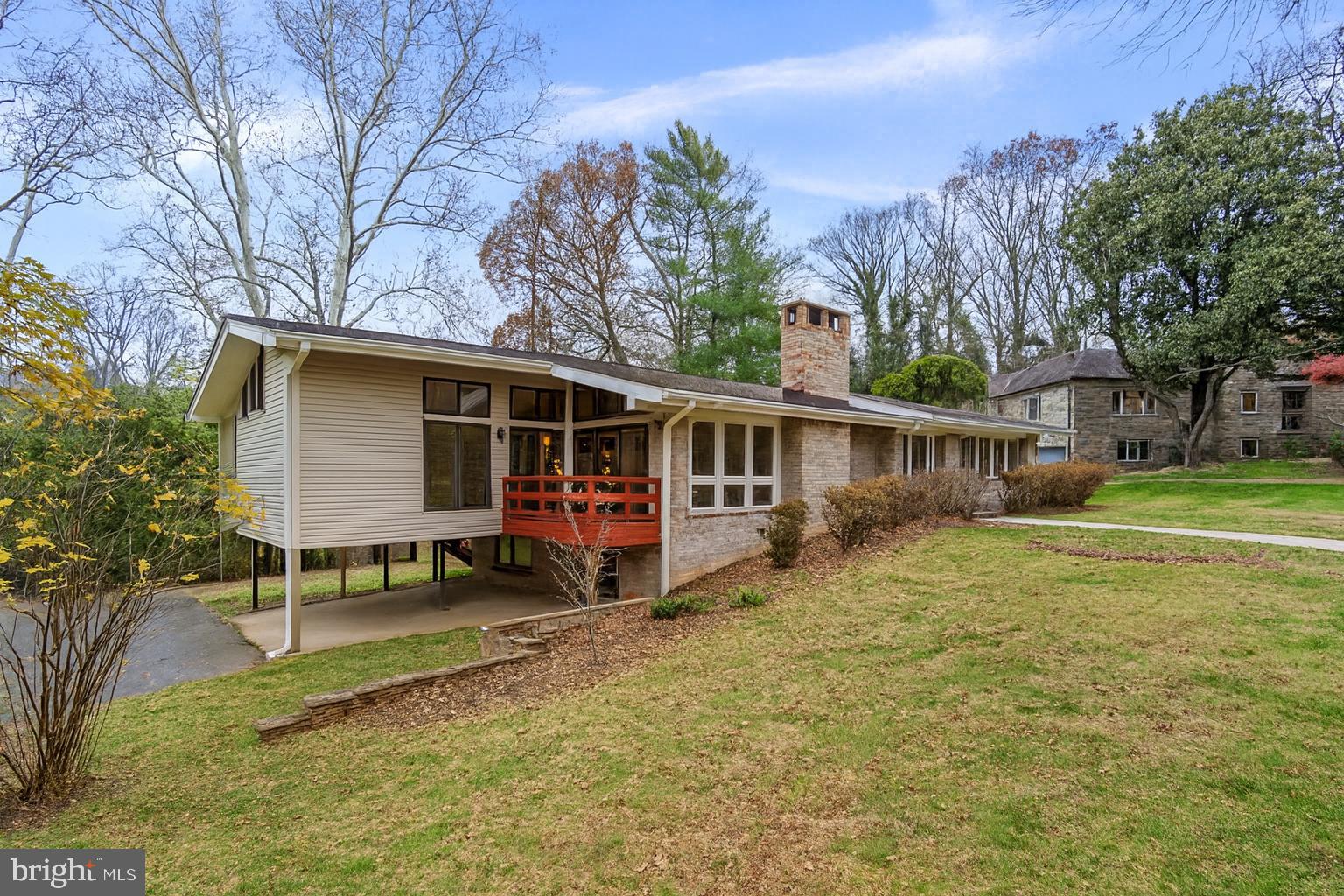 7711 Arrowood Court Bethesda, MD 20817 - Photo 54 of 59 a view of a house with backyard and sitting area
