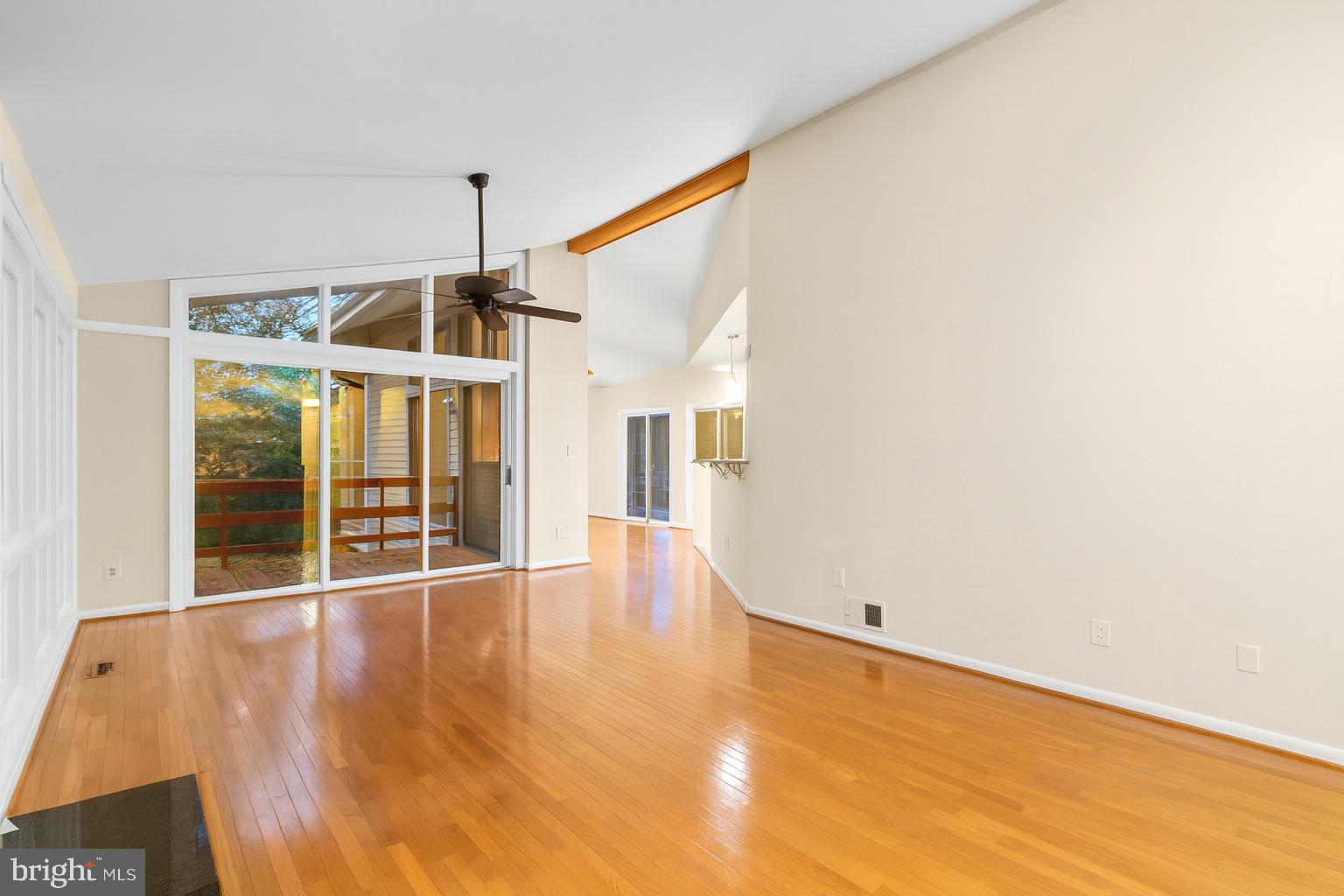 7711 Arrowood Court Bethesda, MD 20817 - Photo 6 of 59 a view of empty room with wooden floor and fan
