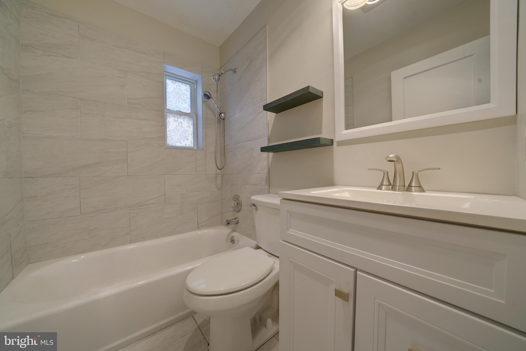 539 St Patrick Road Baltimore, MD 21206 - Photo 21 of 33 Updated bath with new fixtures & tile