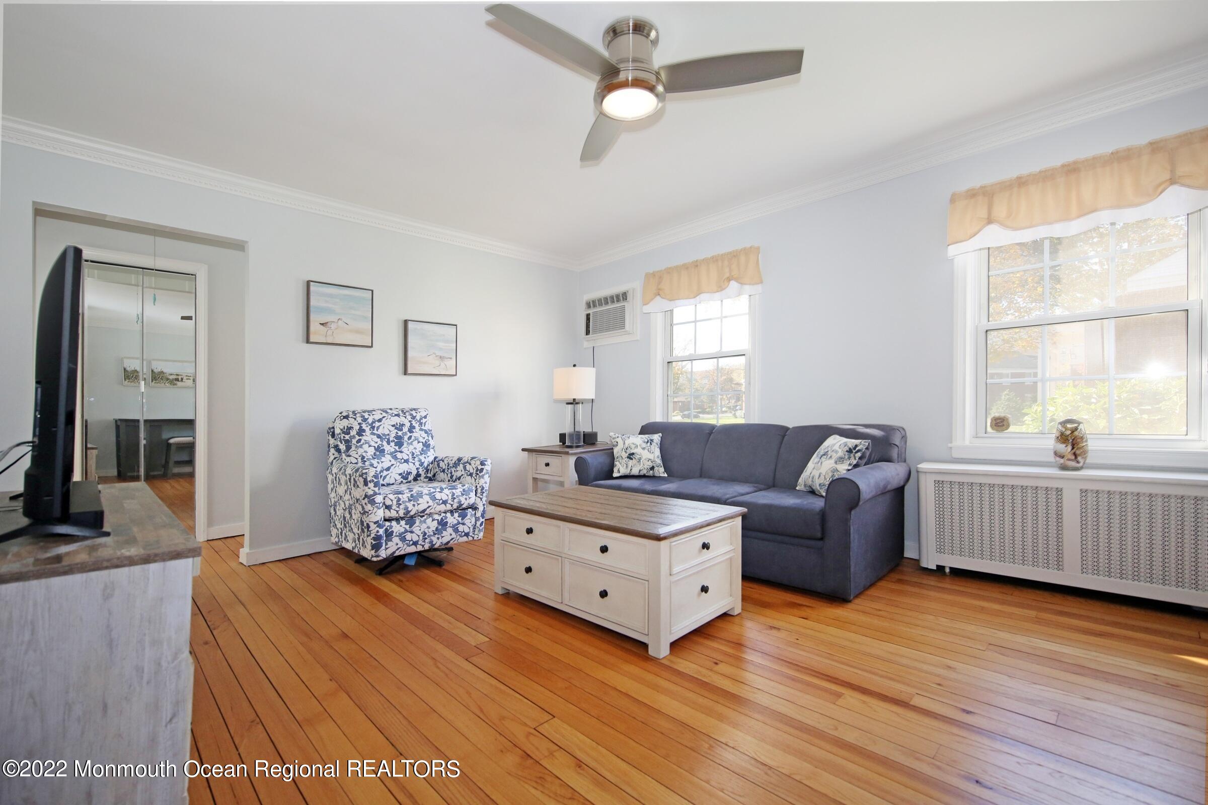 40 Pinckney Road, Unit 40B Red Bank, NJ 07701 - Photo 7 of 23 a living room with furniture and a window
