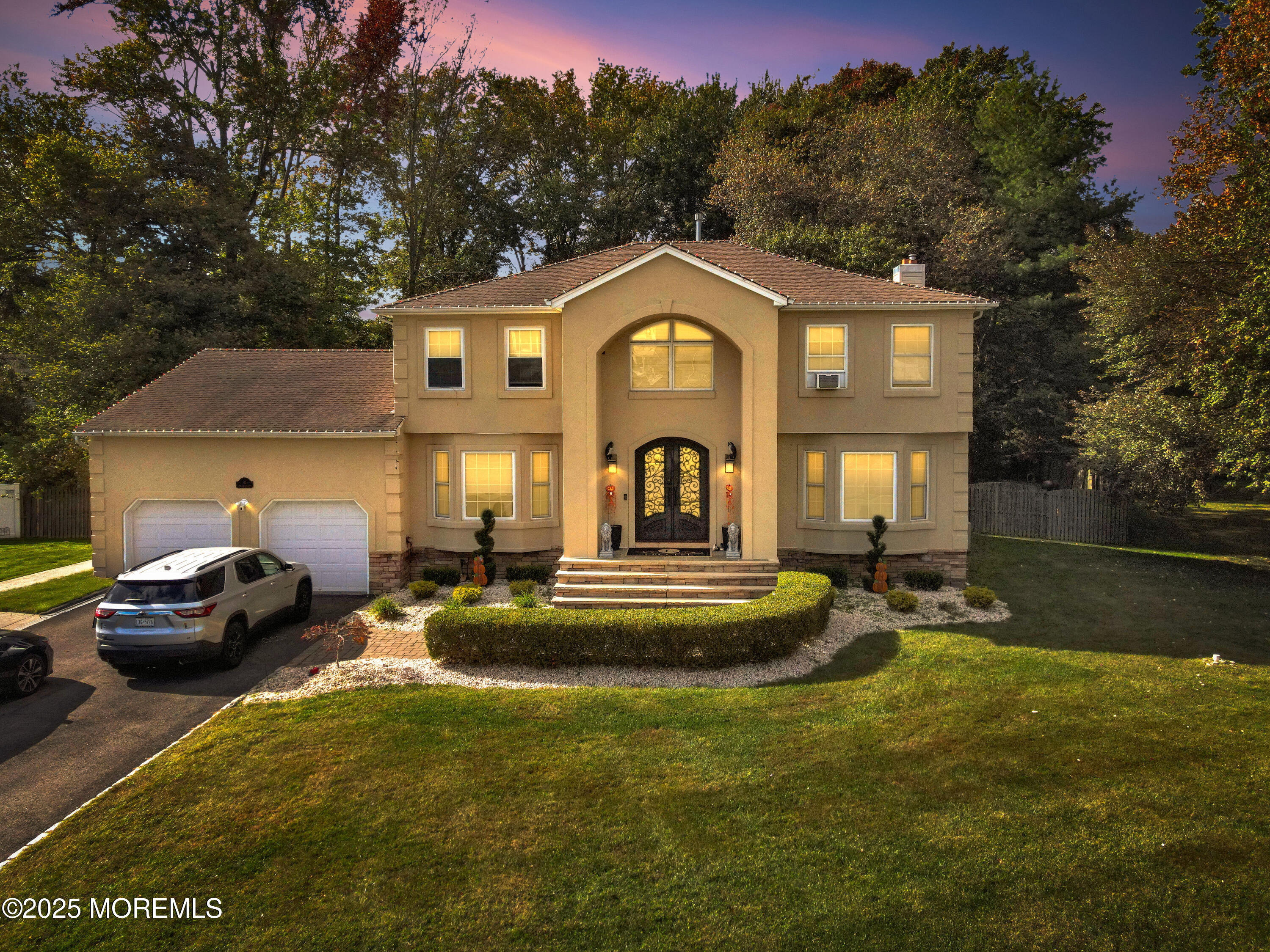 a view of a house with swimming pool and sitting area