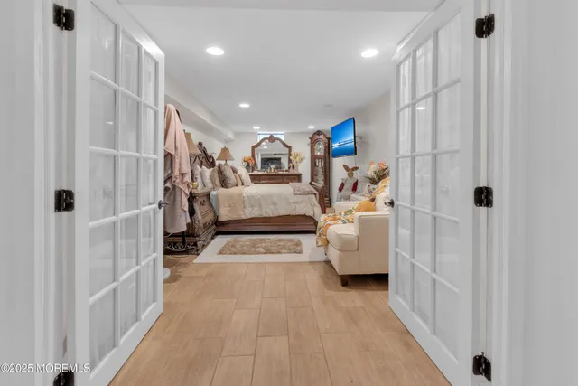 a view of living room with furniture and a rug