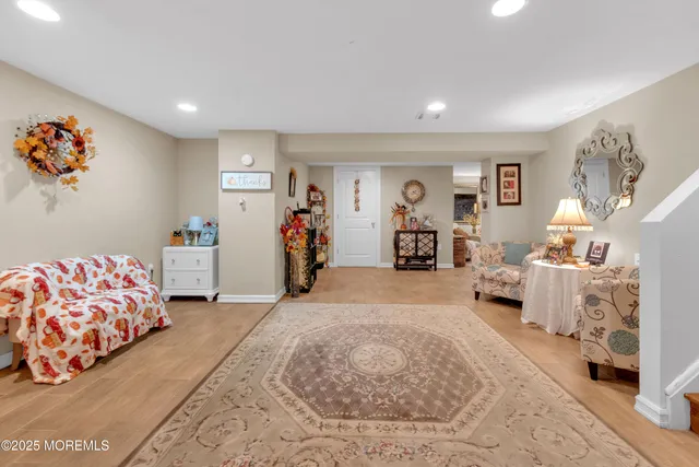 a living room with furniture and window