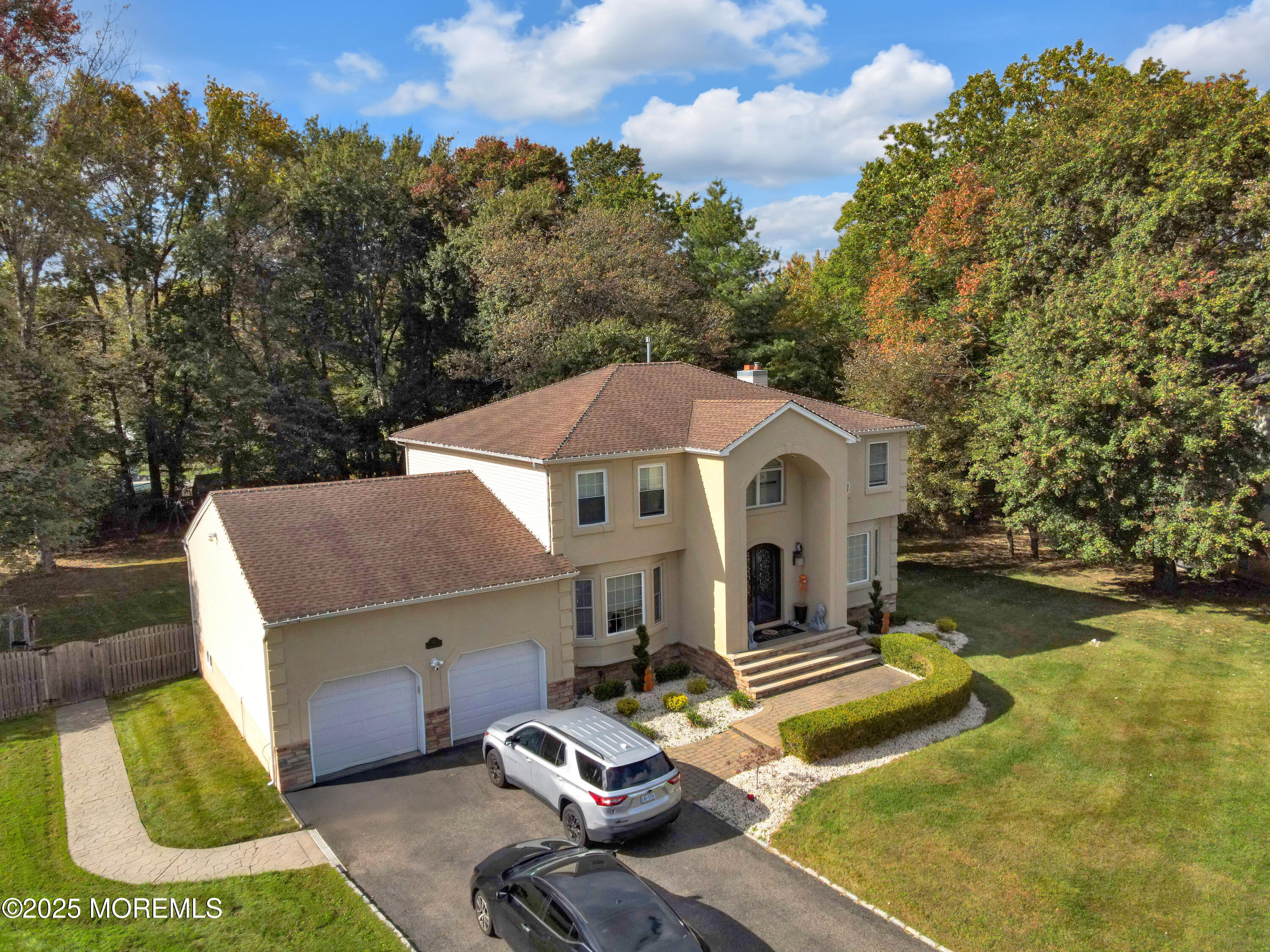 41 Longstreet Road Manalapan, NJ 07726 - Photo 49 of 51 a front view of a house with garden
