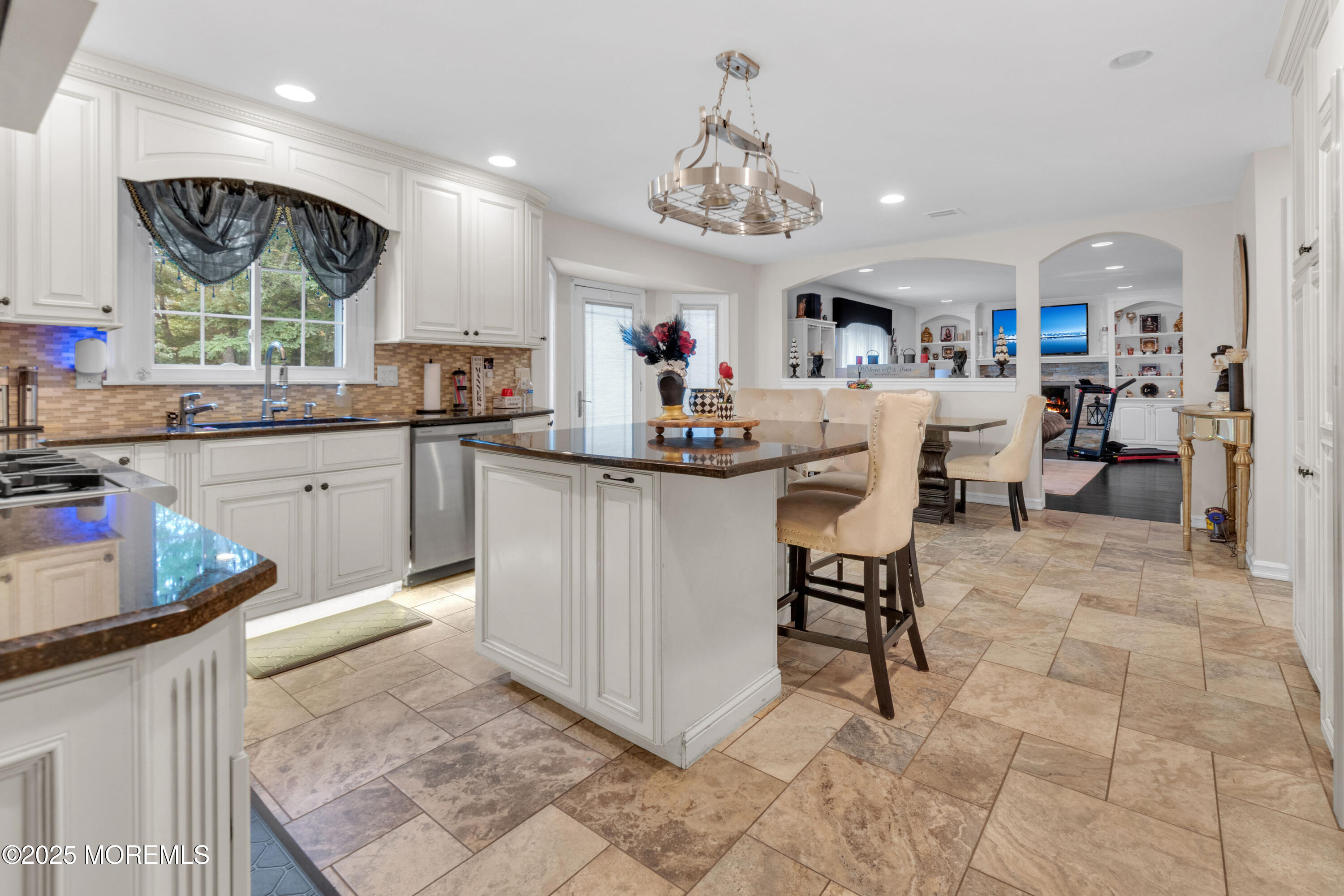 41 Longstreet Road Manalapan, NJ 07726 - Photo 10 of 51 a kitchen with stainless steel appliances granite countertop a sink and a refrigerator