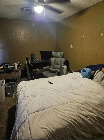 a bathroom with a bathtub and toilet